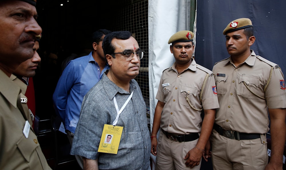 India's Congress back then party leader and candidate Ajay Maken walks out from a counting station in New Delhi, India, Friday, May 16, 2014(AP)