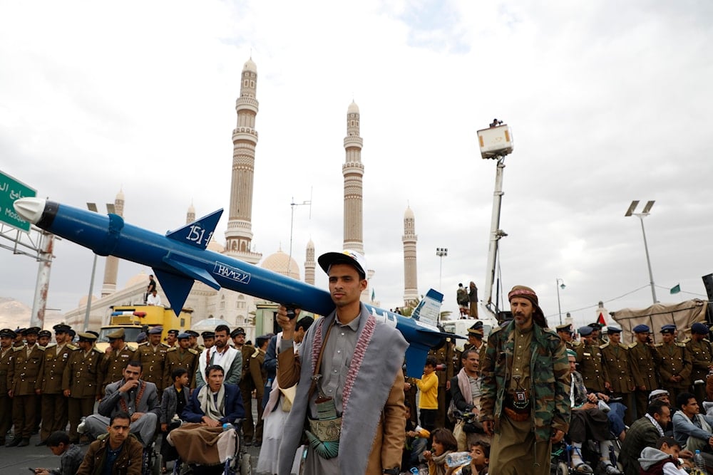 Yemenis rally against the US-led strikes against Yemen and in the support of Palestinians in the Gaza Strip, in Sanaa, Yemen, February 16, 2024 (AP)