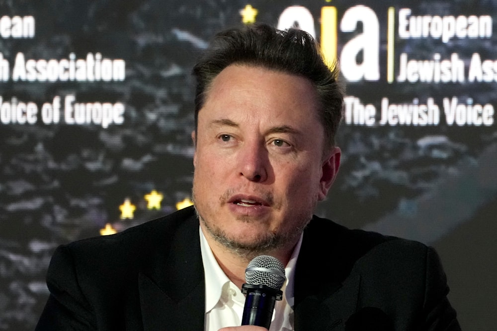 Elon Musk addresses the European Jewish Association's conference, in Krakow, Poland, on Jan. 22, 2024. (AP)