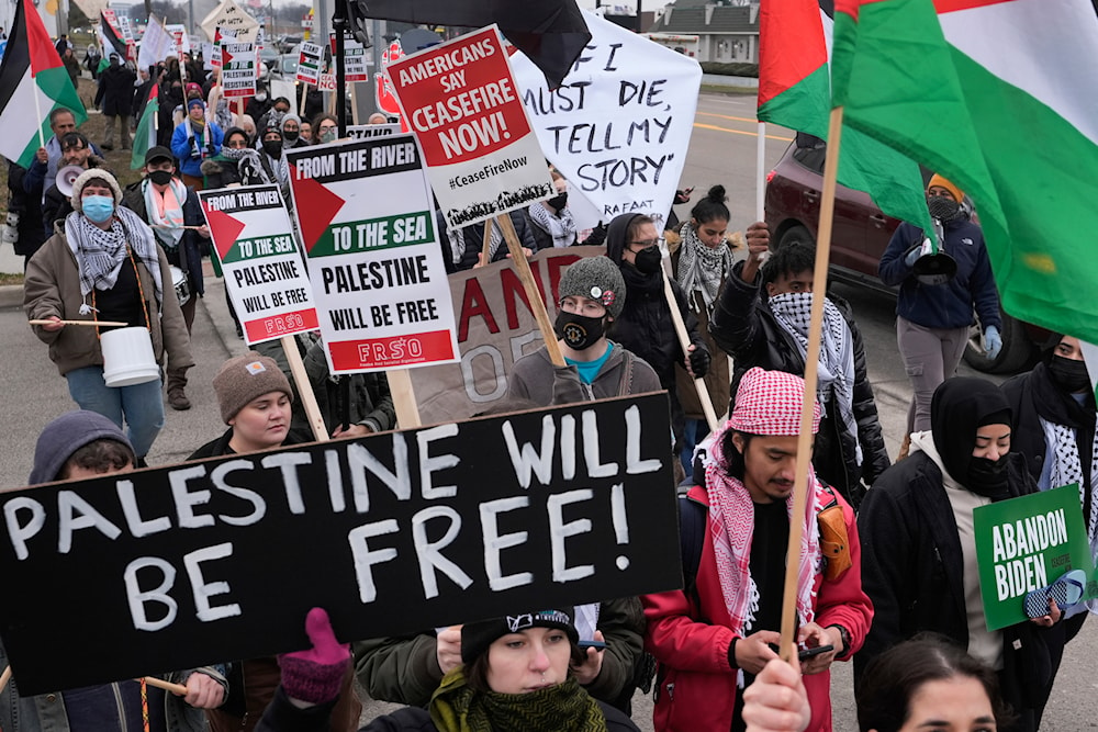 Pro-Palestinian demonstrators march during a visit by President Joe Biden in Warren, Mich., Thursday, Feb. 1, 2024. (AP)
