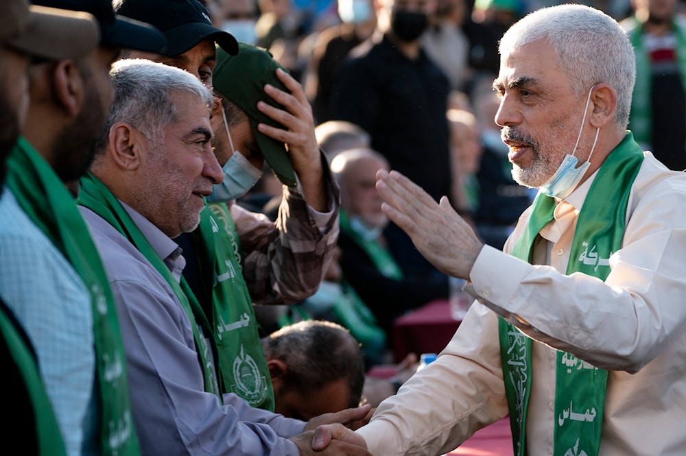Yahya Sinwar, Palestinian leader of Hamas in the Gaza Strip, greets supporters at a rally days after a cease-fire was reached following an 11-day war between Gaza's Hamas rulers and 'Israel', on May 24, 2021, in Gaza City, the Gaza Strip.(AP)
