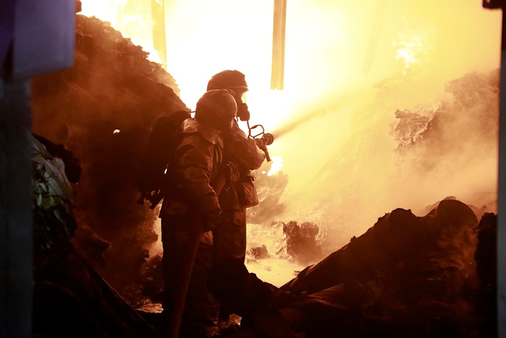 Firefighters put off a fire caused by an explosion at an industrial building in Nairobi, Kenya Friday, Feb. 2, 2024. (AP)