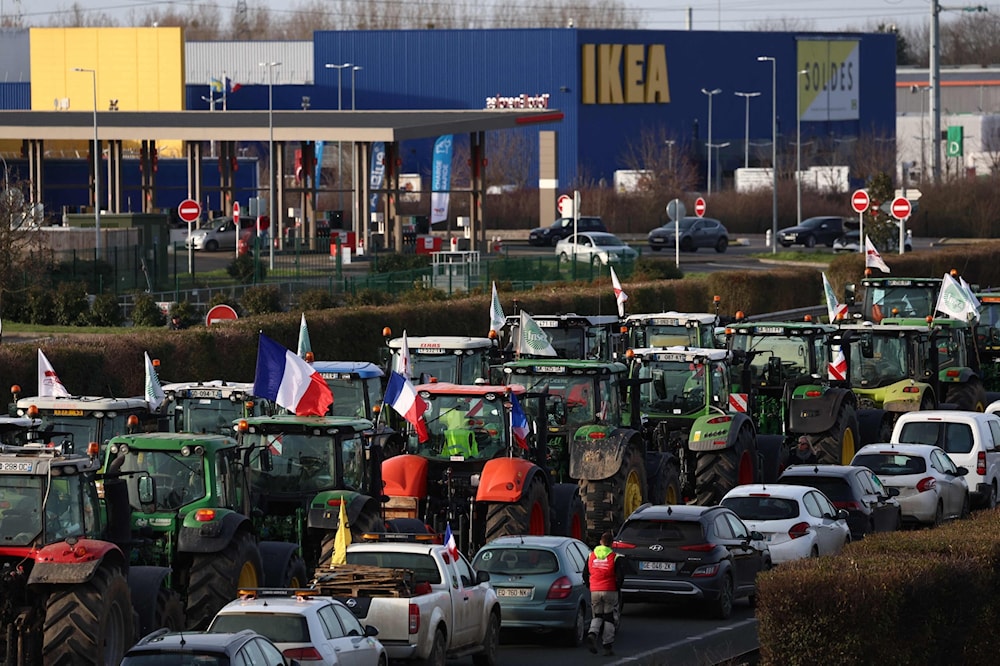 French farmers end Paris blockade on government promise for summer aid