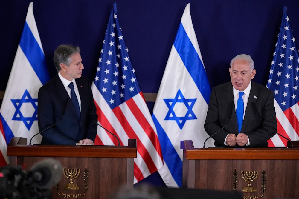 U.S. Secretary of State Antony Blinken, left, and Israel's Prime Minister Benjamin Netanyahu make statements to the media inside The Kirya, which houses the Israeli Ministry of Security, after their meeting in 'Tel Aviv', Thursday Oct. 12, 2023. (AP)