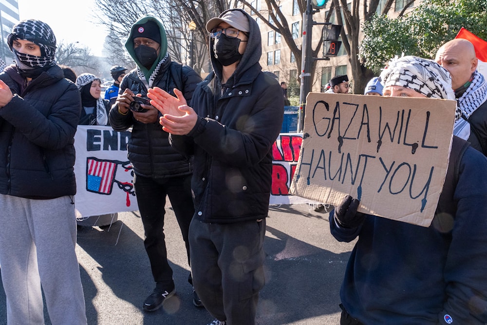 Pro-Palestinian protesters block the intersection of E St NW at New Jersey Ave. NW, near the Capitol, Thursday, Feb. 1, 2024, in Washington. (AP)
