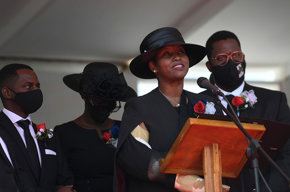 Former first lady of Haiti, Martine Moise, speaks during the funeral of her slain husband, former President Jovenel Moise, accompanied by her children in Cap-Haitien, Haiti, Friday, July 23, 2021.(AP)