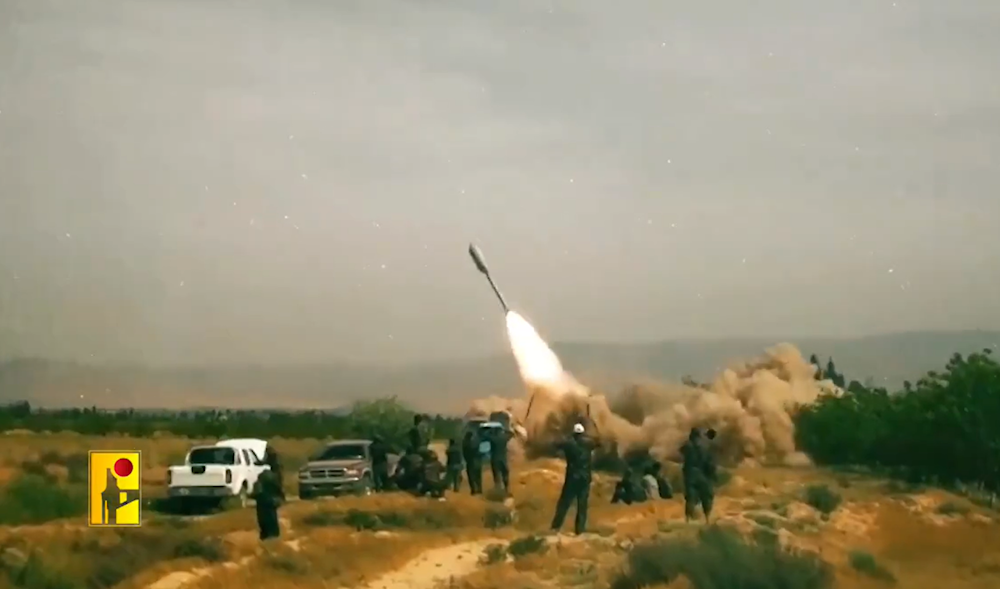 Hezbollah fighters launching the Burkan rocket in a video titled 