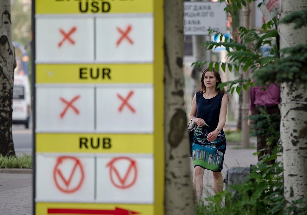 A billboard for an exchange office indicates it only performs transactions for Russian rubles in Donetsk, Ukraine, Friday, May 30, 2014. (AP)