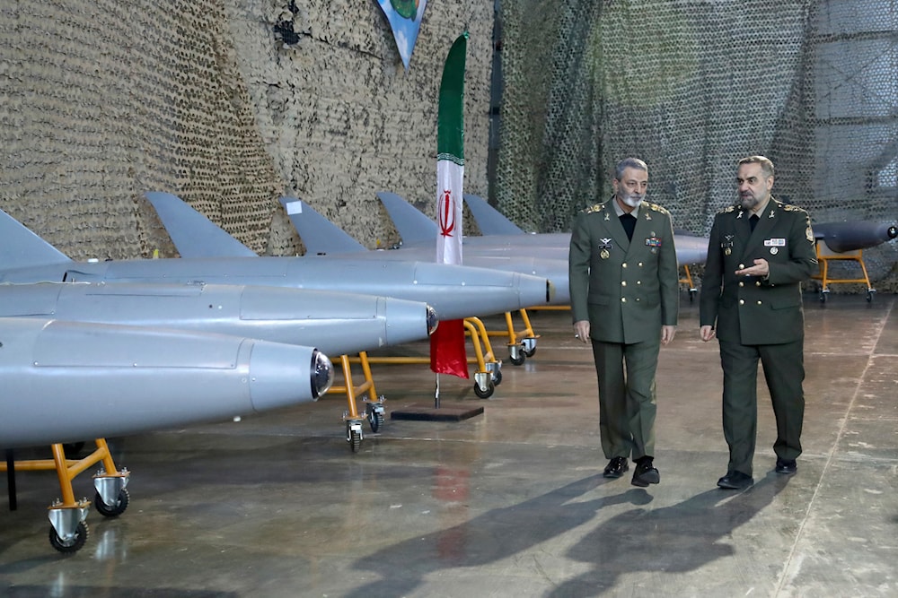 In this image released by the Iranian Defense Ministry on, January 23, 2024, Defense Minister Gen. Mohammad Reza Gharaei Ashtiani talks with army commander Gen. Abdolrahim Mousavi, in a ceremony, Iran (AP)