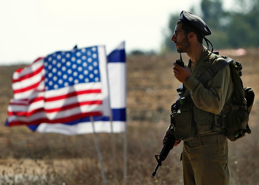 An IOF troop waits for the visit of U.S. Joint Chiefs of Staff Chairman, Army Gen. Martin Dempsey, not seen, to an Iron Dome rocket defense shield battery near occupied Palestine Tuesday, Oct. 30, 2012.(AP)