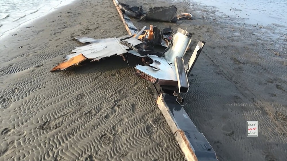 A photo showing the remains of the MQ-9 US-made drone after Yemeni air defense systems fired at it and took it down over al-Hodeidah on Monday, February 19, 2024.( YAF Military Media)