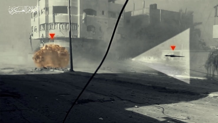 A tandem RPG shell launched by the Palestinian Resistance heads toward an Israeli military vehicle in the Gaza Strip, occupied Palestine, February 22, 2024 (Military media)