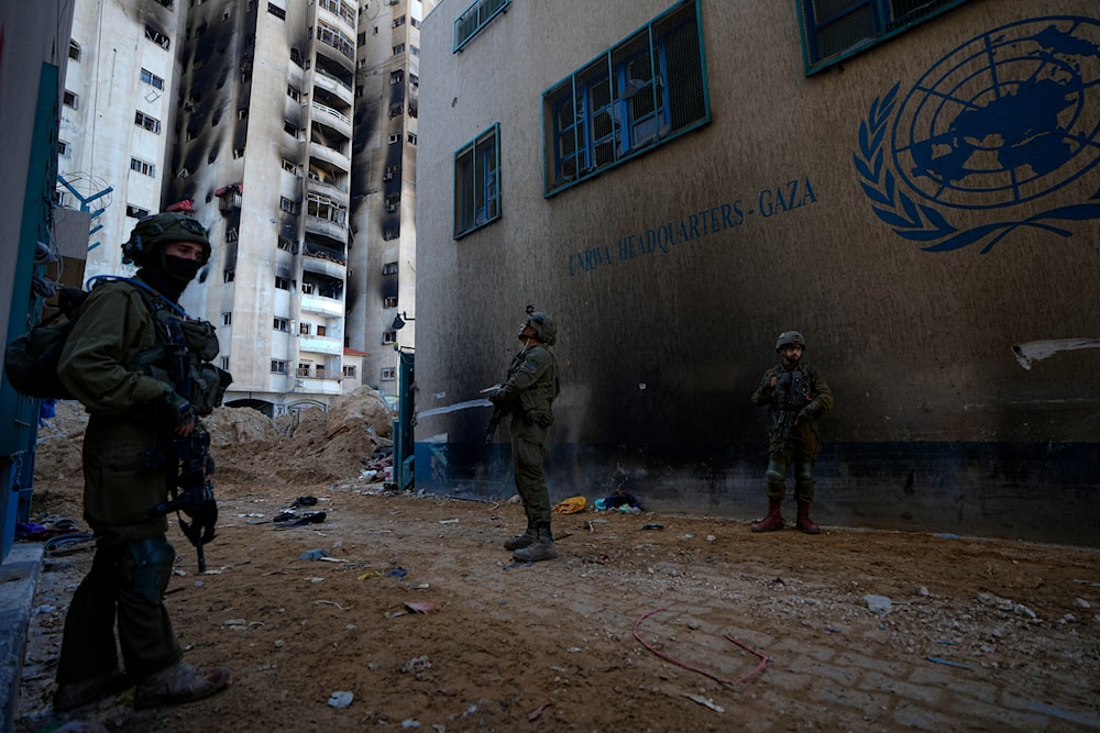 IOF troops surround the UNRWA headquarters during a ground operation in Gaza, on Thursday, Feb. 8, 2024.(AP)