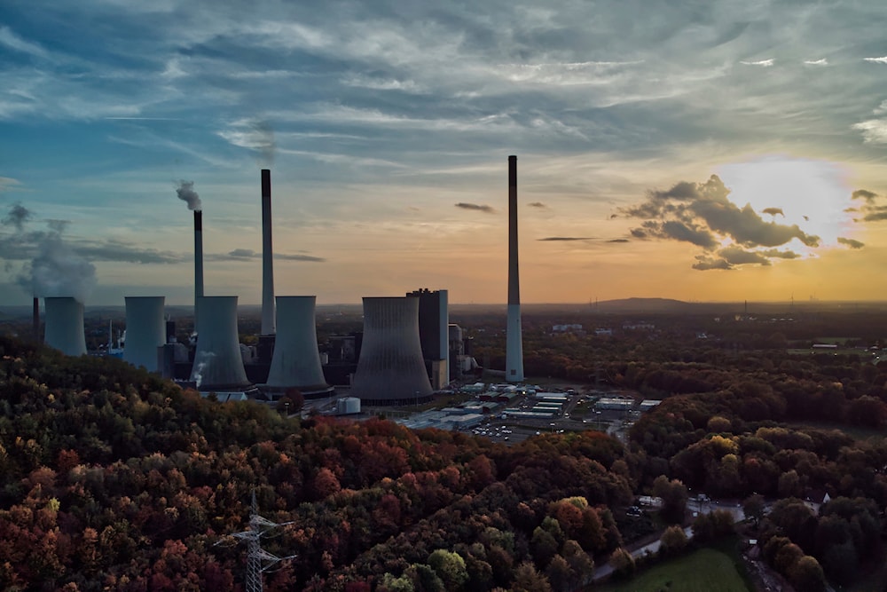 The sun sets behind the cole-fired power plant 'Scholven' of the Uniper energy company in Gelsenkirchen, Germany, on Oct. 22, 2022(AP)