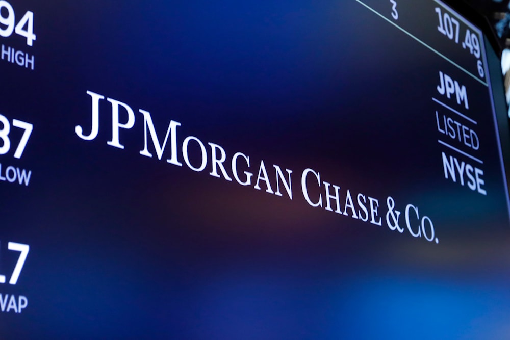 The logo for JPMorgan Chase & Co. appears above a trading post on the floor of the New York Stock Exchange in New York, Aug. 16, 2019.(AP)