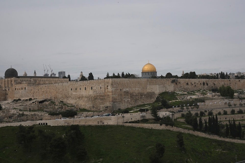 The Dome of the Rock Mosque in the al-Aqsa Mosque compound in occupied al-Quds' Old City during Friday prayers, as many Palestinian Muslims prayed outside after being denied entry, February 23, 2024 (AP)