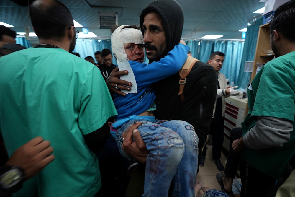 Palestinians wounded in the Israeli bombardment of the Gaza Strip are brought to Al Aqsa hospital in Deir al Balah, Friday, Feb. 23, 2024. (AP)