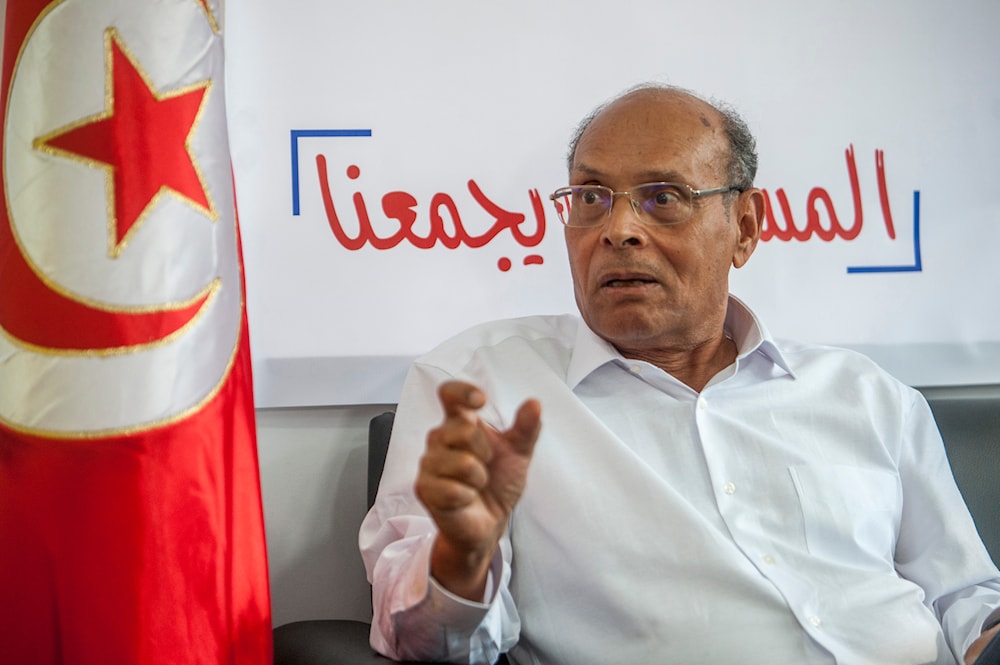 Former Tunisian President and head of el-Harak party Moncef Marzouki speaks to The AP in Tunis, on Aug.28, 2019. (AP)
