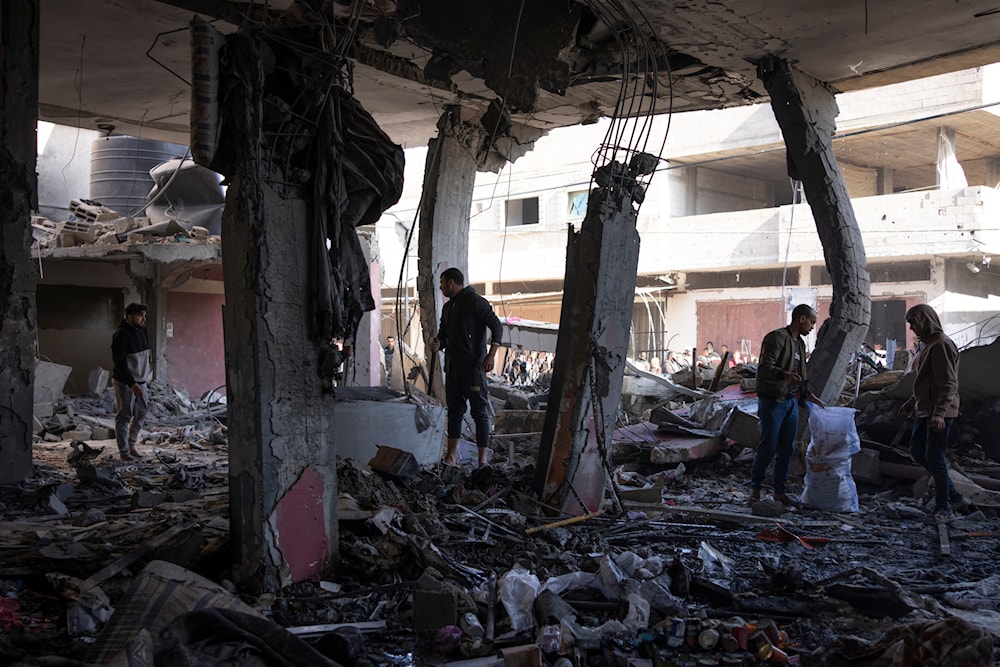 Palestinians check destruction by an Israeli strike in Rafah, Gaza Strip, Saturday, Feb. 24, 2024. (AP)