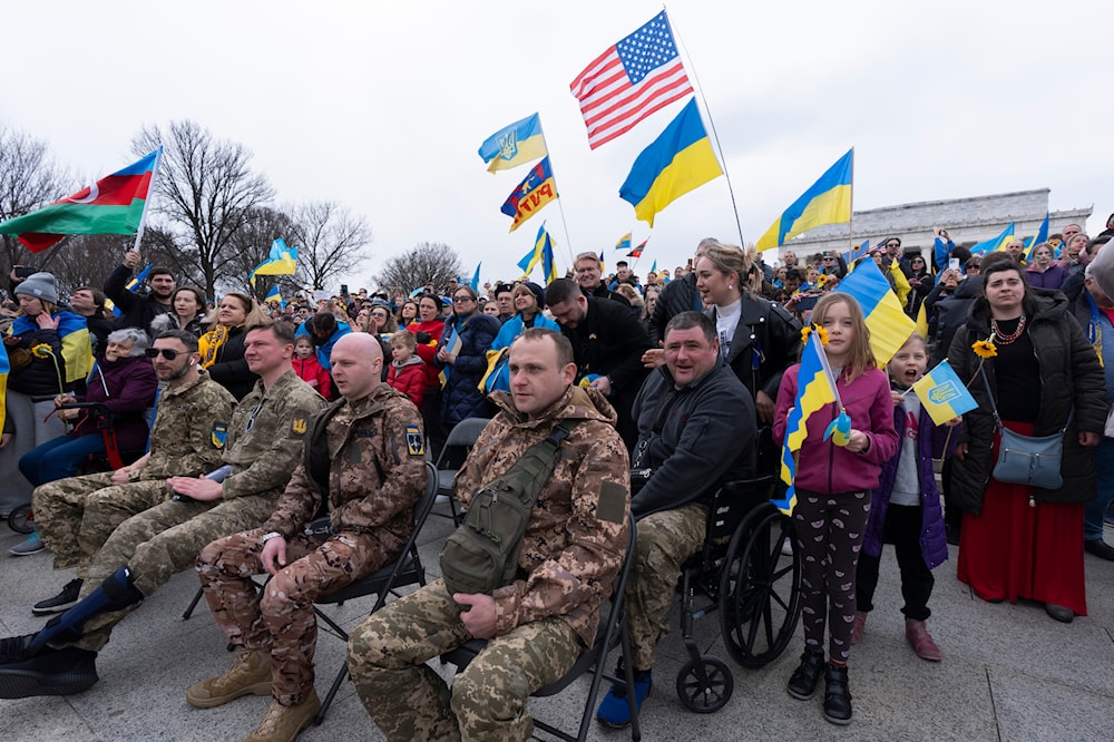 Ukrainian soldiers join a rally at the National Mall near the Lincoln Memorial in Washington, marking two years since Ukraine, Saturday, Feb. 24, 2024. (AP)