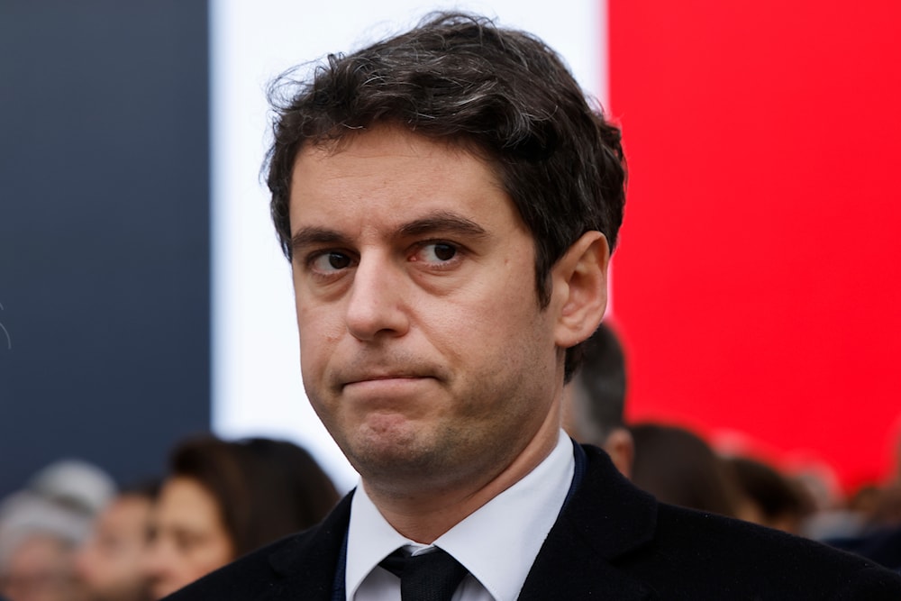 France's Prime Minister Gabriel Attal looks on during a ceremony for former French justice minister during a national tribute ceremony in his honor outside the Ministry of Justice, at the Place Vendome, in Paris Wednesday, Feb. 14, 2024. (AP)