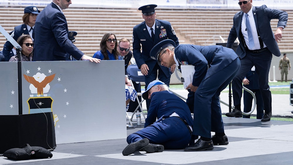  President Joe Biden tripped on a sandbag and fell as he completed handing out diplomas at the US Air Force Academy commencement in Colorado, US, on June 1st, 2023 (CNN)