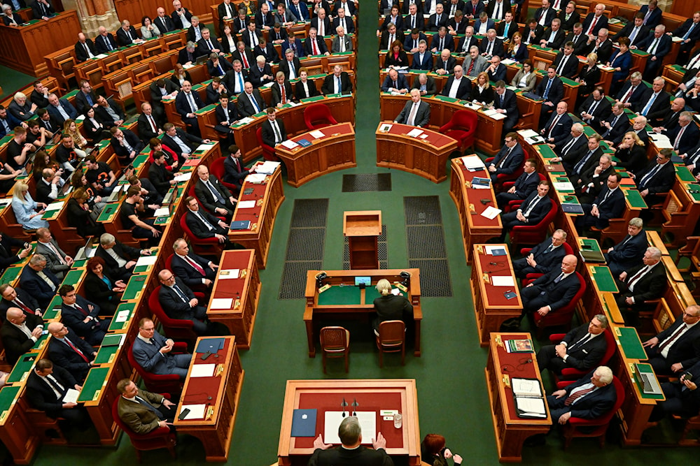 Hungarian Prime Minister Viktor Orban addresses a parliament session, on the day lawmakers are expected to approve Sweden's accession into NATO, in Budapest, Hungary, Monday, Feb 26, 2024.(AP)