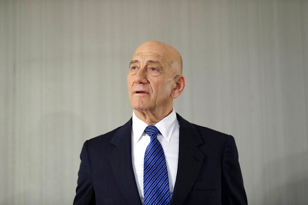 Former Israeli Prime Minister Ehud Olmert takes questions from reporters after a news conference in New York, Tuesday, Feb. 11, 2020. (AP)