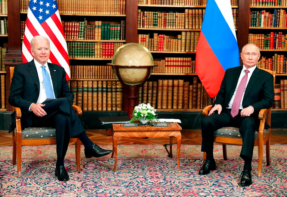 U.S President Joe Biden, left, and Russian President Vladimir Putin pose for media during their meeting at the 'Villa la Grange' in Geneva, Switzerland in Geneva, Switzerland, Wednesday, June 16, 2021 (AP)