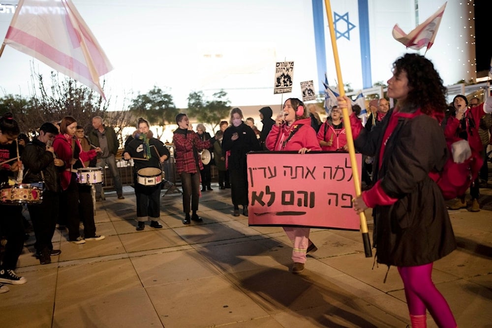 Activists protest against Prime Minister Benjamin Netanyahu, calling for new elections in