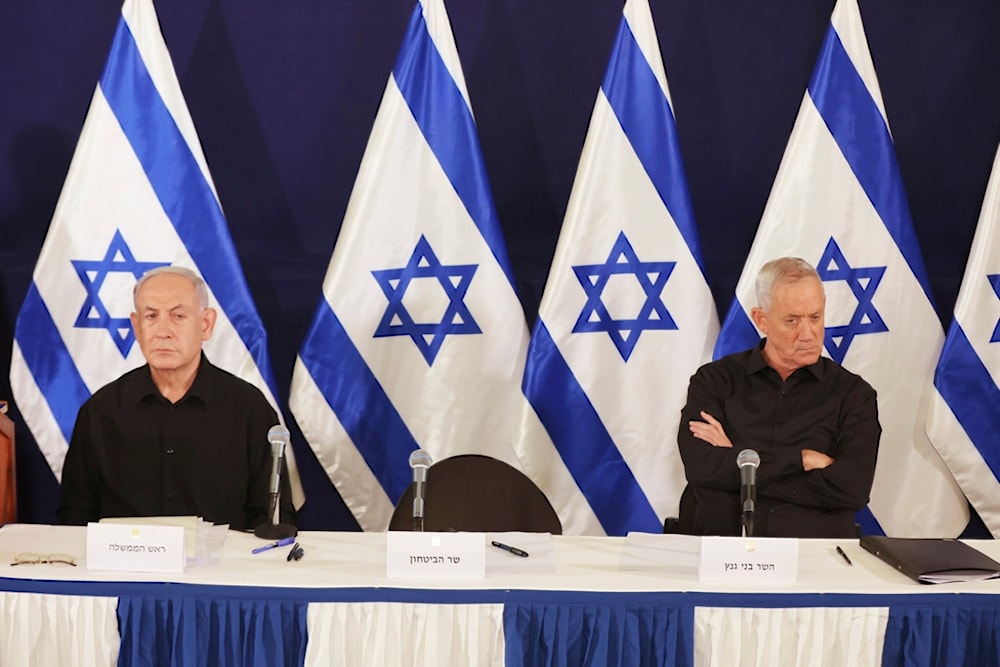 Israeli Prime Minister Benjamin Netanyahu and Cabinet Minister Benny Gantz attends a press conference in the Kirya military base in 