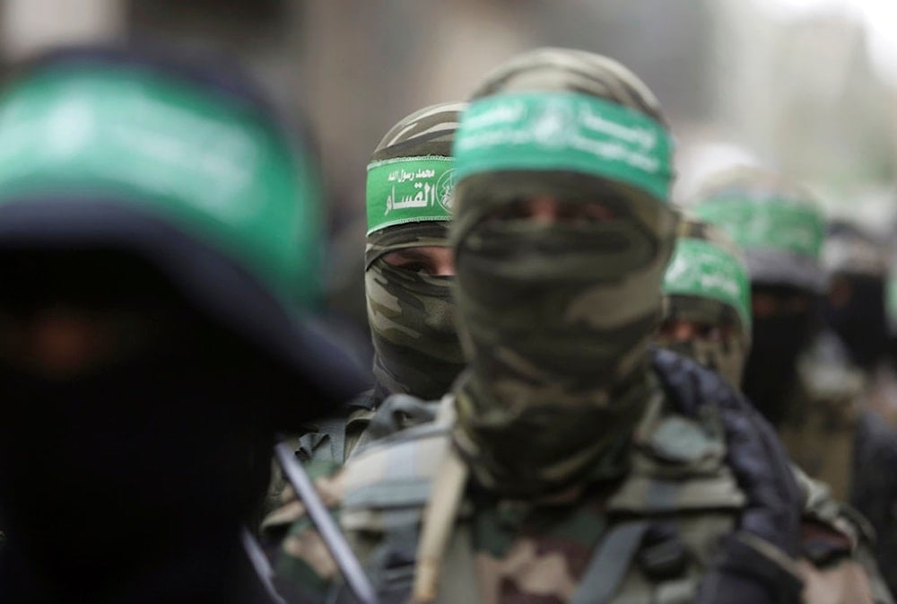 Masked Palestinian Hamas members, in Deir el-Balah, central Gaza Strip, Sunday, May 6, 2018. (AP)