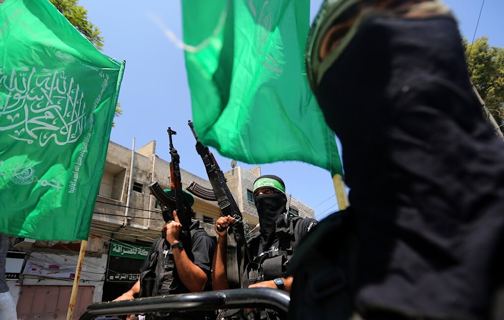 Masked Palestinian members of the Ezz Al-Din Al Qassam brigade, the military wing of Hamas, in Gaza on Saturday, June 21, 2014 (AP)