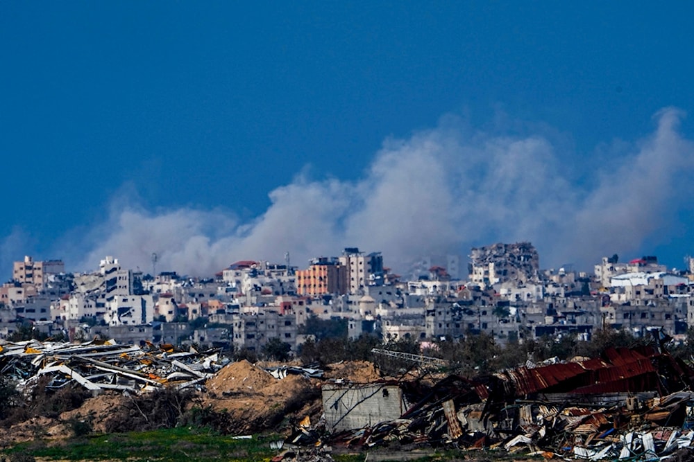 Smoke rises following an Israeli bombardment in the Gaza Strip, as seen from southern occupied Palestine, Sunday, Feb. 4, 2024 (AP)