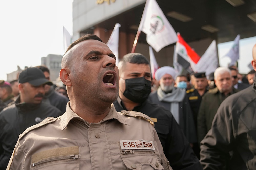 Members of the Iraqi Resistance attend a funeral for Resistance fighters killed by a US air strike, in Baghdad, Iraq, February 4, 2024 (AP)