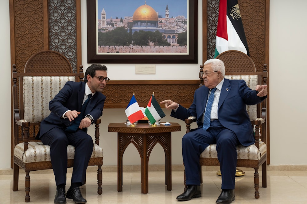 Palestinian President Mahmoud Abbas, right, receives French foreign minister Stéphane Séjourné at his office in the West Bank city of Ramallah, Monday, Feb. 5, 2024(AP)