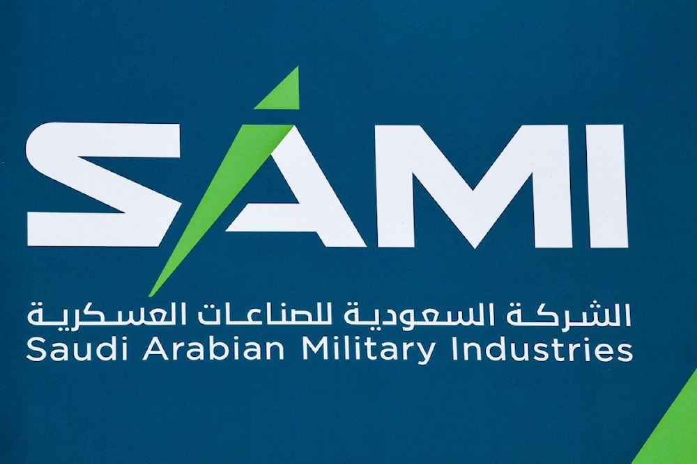 Logo of Saudi Arabian Military Industries (SAMI) on display, 18 November 2019 (AFP)