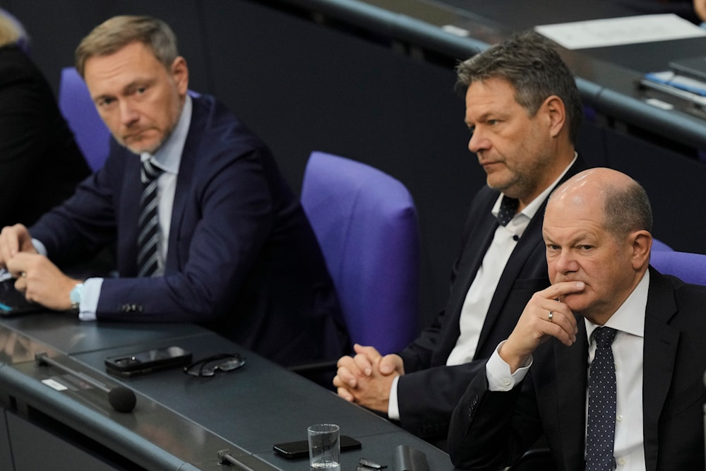 German Chancellor Olaf Scholz, Economy and Climate Minister Robert Habeck and Finance Minister Christian Lindner at the Bundestag in Berlin, Germany, Nov. 28, 2023. (AP)