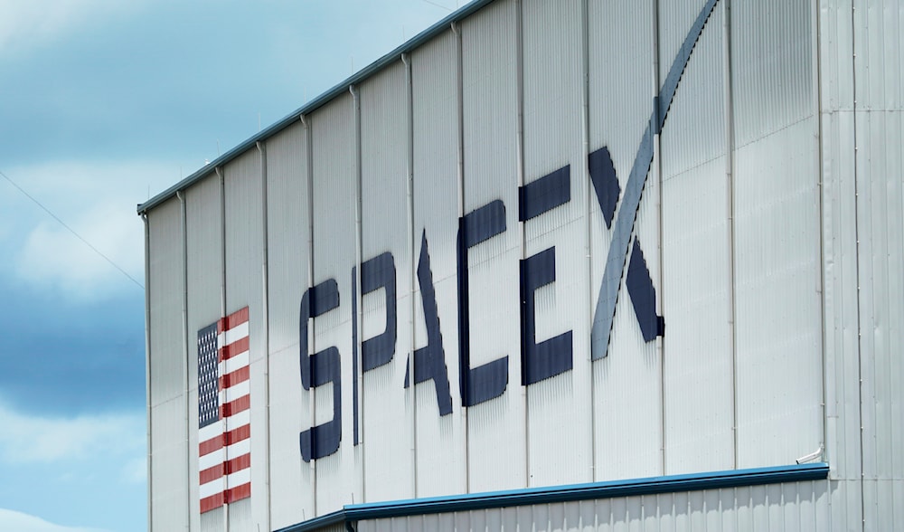 The SpaceX logo is displayed on a building, May 26, 2020, at the Kennedy Space Center in Cape Canaveral, Florida (AP)