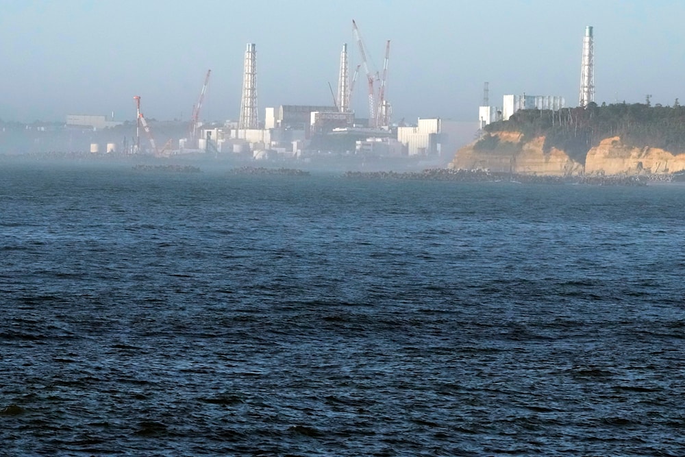 The Fukushima Daiichi nuclear power plant is seen from the nearby Ukedo fishing port in Namie, Japan, on Aug. 24, 2023. (AP)