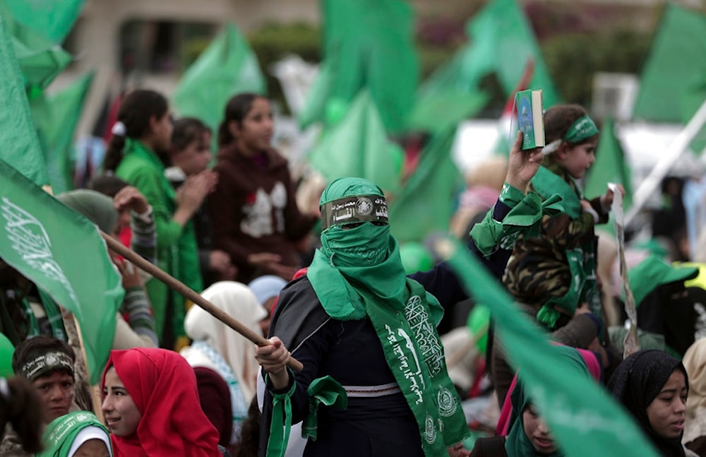 Palestinian Hamas supporters attend a Rally marking the 30th anniversary of Hamas movement, in Gaza City, Thursday, Dec. 14, 2017. (AP)