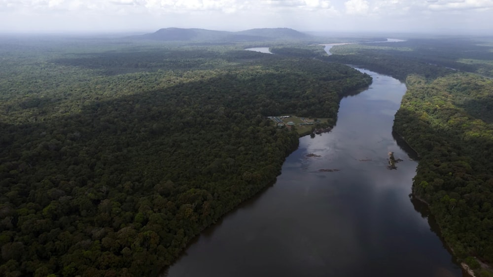 The Essequibo river flows through Kurupukari crossing, Nov. 19 2023. (AP)