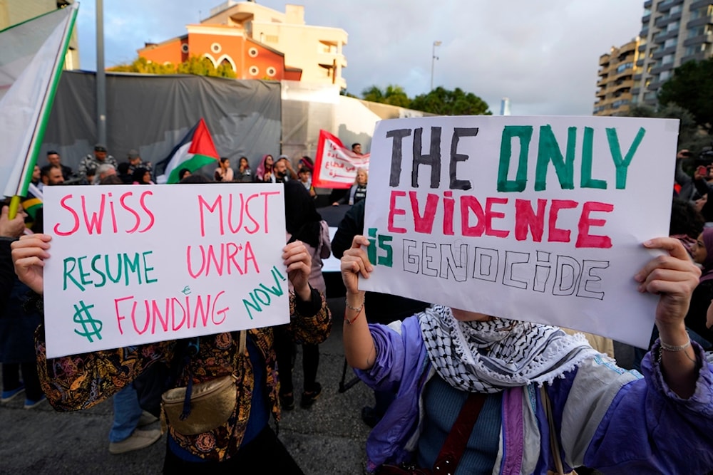 Activists demand countries to resume funding of the United Nations Relief and Works Agency for Palestinians Refugees (UNRWA) and to support Palestinians in the Gaza Strip, near the EU headquarters in Beirut, Lebanon, Wednesday, Feb. 7, 2024. (AP)