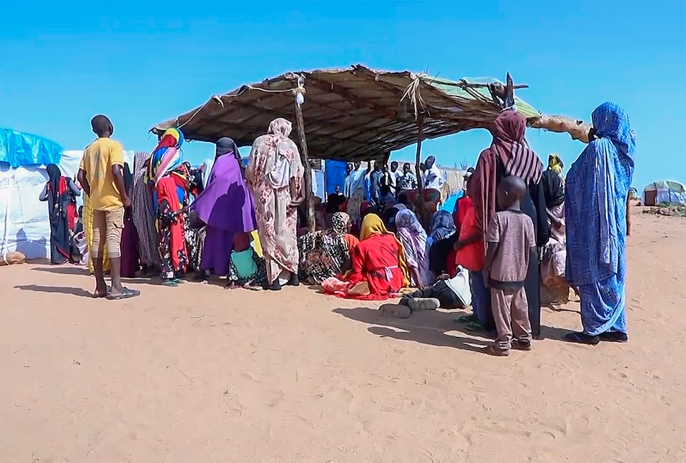 Sudanese refugees gather outside a field hospital in Acre, Chad, Aug. 15, 2023(AP)