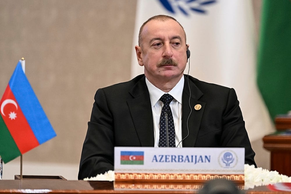 n this photo released by Uzbekistan's President Press Office, Azerbaijan's President Ilham Aliyev attends the Summit of the Economic Cooperation Organisation (ECO) in Tashkent, Uzbekistan, on Thursday, Nov. 9, 2023 (AP)