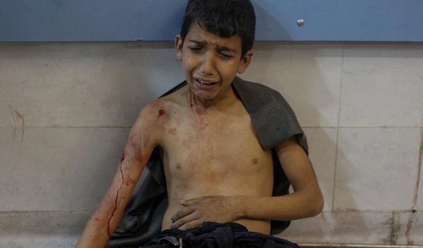 A Palestinian child that survived Gaza's al-Rashid massacre in a hospital in Gaza on February 29.(X, @AbwBwd89445)