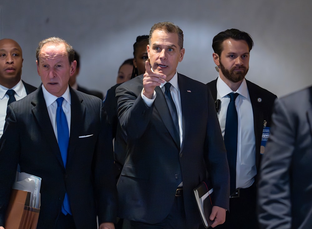 Hunter Biden with attorney Abbe Lowell, left, leaves after a closed-door deposition in the Republican-led investigation into the Biden family, on Capitol Hill in Washington, Feb. 28, 2024. (AP)