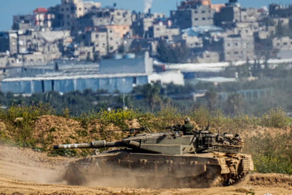 Israeli soldiers drive a tanks in the Gaza Strip, Sunday, March 10, 2024 (AP Photo)