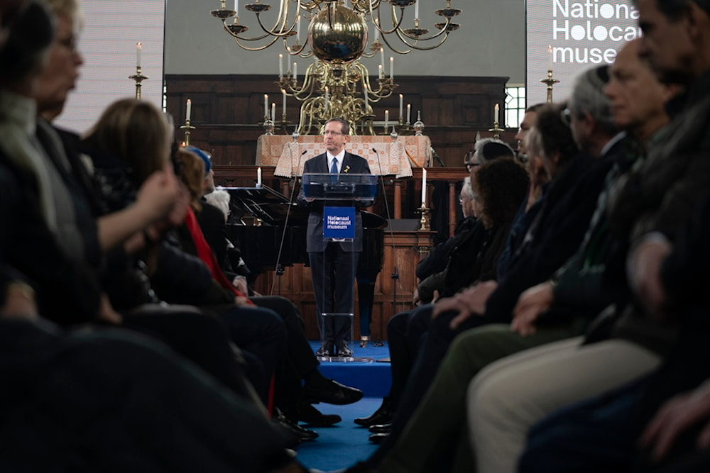 Israel's President Isaac Herzog speaks at the Portuguese Synagogue during a ceremony marking the opening of the new National Holocaust Museum in Amsterdam, Netherlands, Sunday, March 10, 2024. (AP)