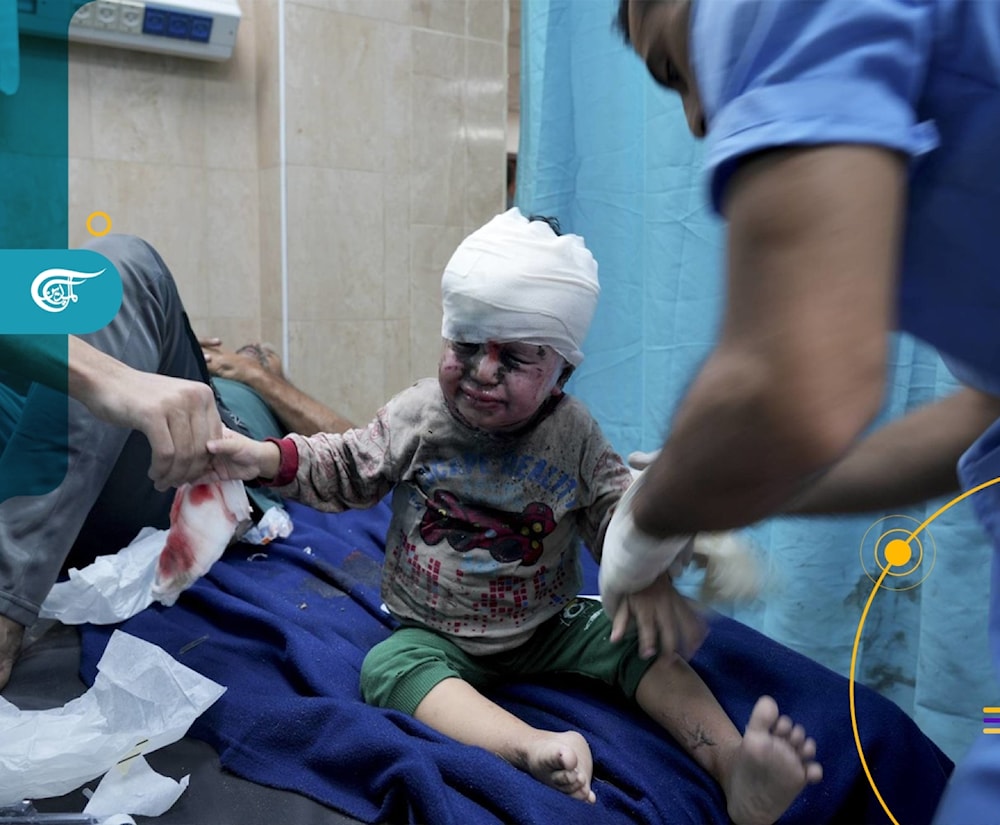 A child is given treatment in a Gaza hospital after being injured in an Israeli airstrike. (Al Mayadeen Net)